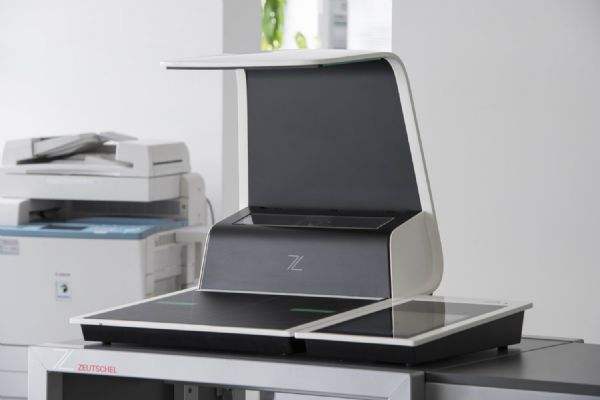 賽數(shù)案例 | 非接觸式書刊掃描儀在高校圖書館